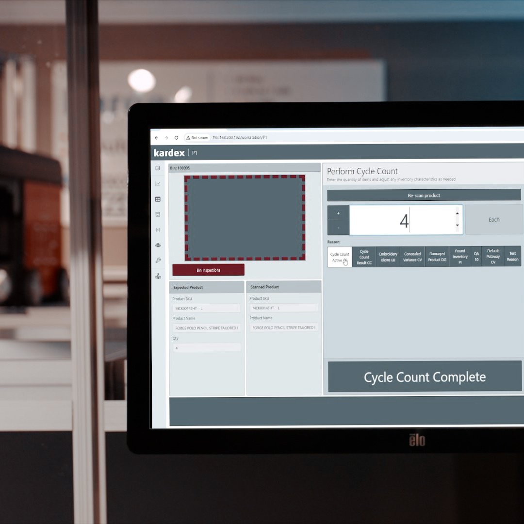 Computer monitor in front of AutoStore robot showing cycle count tasks